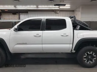 2022 Toyota Tacoma SR with VIN 3TMCZ5AN5NM480311, listed as a IAAI auction lot 42542600 with 43,297 mi miles and . Bid and sale history available at DreamBid. Image 15.