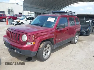 2014 Jeep Patriot Latitude z VIN 1C4NJPFB1ED859456, wystawiony jako IAAI lot #42471828 z przebiegiem 66 233 mil mil oraz . Historia ofert i sprzedaży dostępna na DreamBid. Obrazek 2.