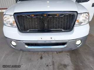 2007 Ford F-150 XLT with VIN 1FTPW12597KD31606, listed as a IAAI auction lot 41735597 with 196,934 mi miles. Bid and sale history available at carsss.com. Image 14.
