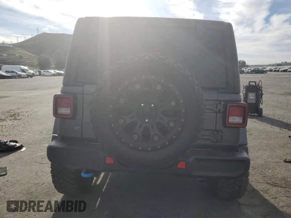2024 Jeep Wrangler Sport S with VIN 1C4RJXN69RW147521, listed as a Copart auction lot 47298575 with 55,477 mi miles and Salvage Title. Bid and sale history available at DreamBid. Image 6.