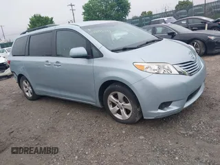 2015 Toyota Sienna LE AAS with VIN 5TDKK3DC4FS663876, listed as a IAAI auction lot 42155091 with 82,602 mi miles and . Bid and sale history available at DreamBid. Image 1.