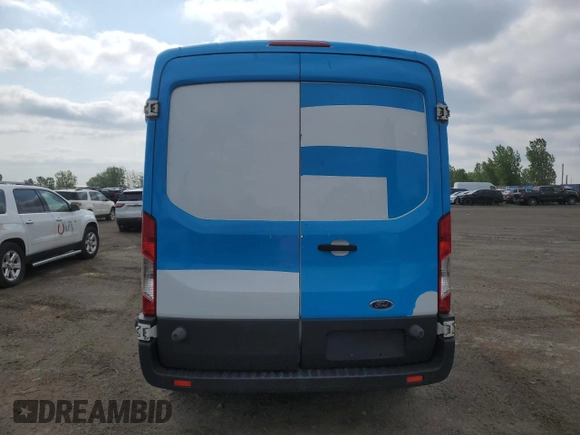2015 Ford Transit Cargo with VIN 1FTNR2CM2FKB24077, listed as a Copart auction lot 57963285 with 239,419 mi miles and Salvage title. Bid and sale history available at DreamBid. Image 6.