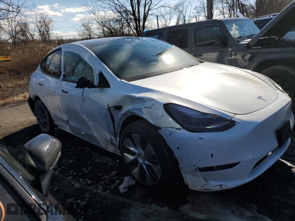 2023 Tesla Model Y Long Range z VIN 7SAYGDEE5PF785124, wystawiony jako Copart lot #56553785 z przebiegiem 31 341 mil mil oraz Szkoda całkowita • Salvage title. Historia ofert i sprzedaży dostępna na DreamBid. Obrazek 4.