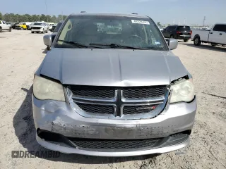 2014 Dodge Grand Caravan SXT with VIN 2C4RDGCG2ER273533, listed as a Copart auction lot 49228495 with 124,070 mi miles and Salvage Title. Bid and sale history available at DreamBid. Image 5.