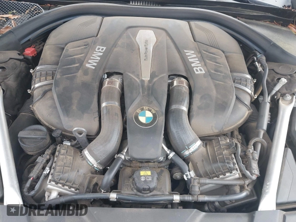 2018 BMW 7 Series 750i z VIN WBA7F0C59JGM23945, wystawiony jako IAAI lot #42236737 z przebiegiem 65 576 mil mil oraz . Historia ofert i sprzedaży dostępna na DreamBid. Obrazek 10.