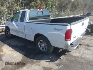 2002 Ford F-150 XL with VIN 1FTRX17L32NA13159, listed as a IAAI auction lot 41653814 with 435,395 mi miles. Bid and sale history available at carsss.com. Image 3.