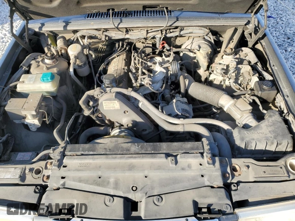 1995 Volvo 900 с VIN YV1JS8316S3193042, выставлен на аукционе Copart как лот 81591334 с пробегом 142 347 миль миль и Списание • Salvage title. История ставок и продаж доступна на DreamBid. Изображение 11.