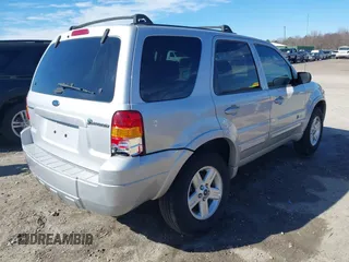 2005 Ford Escape Hybrid with VIN 1FMCU95H45KD16867, listed as a IAAI auction lot 41661311 with 206,698 mi miles. Bid and sale history available at carsss.com. Image 4.