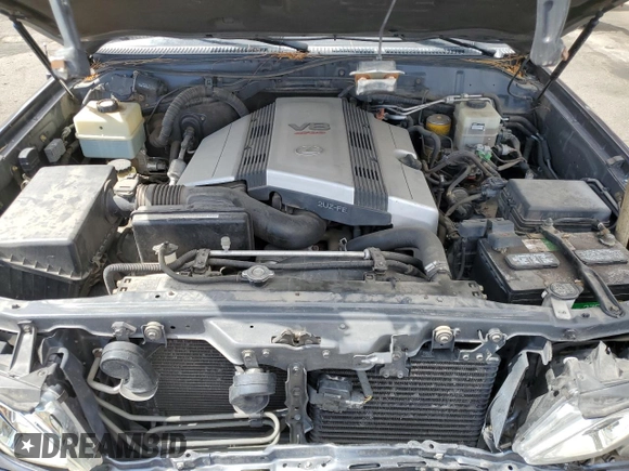 2003 Lexus LX 470 z VIN JTJHT00W633531685, wystawiony jako Copart lot #49729305 z przebiegiem 237 447 mil mil oraz Szkoda całkowita • Salvage title. Historia ofert i sprzedaży dostępna na DreamBid. Obrazek 13.