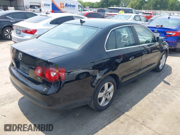 2009 Volkswagen Jetta SE with VIN 3VWRM71K59M137348, listed as a IAAI auction lot 42285086 with 120,645 mi miles and . Bid and sale history available at DreamBid. Image 4.