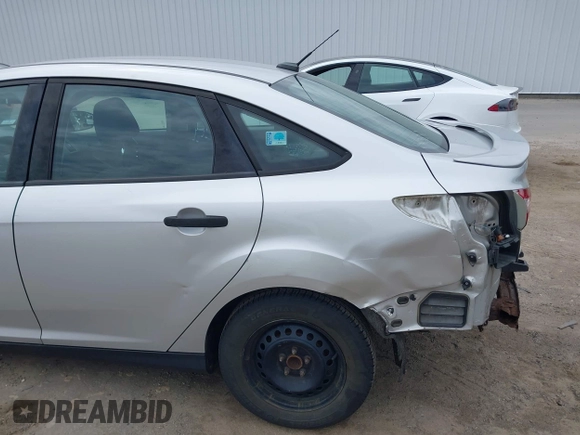 2013 Ford Focus S with VIN 1FADP3E24DL198181, listed as a IAAI auction lot 42052414 with 162,432 mi miles. Bid and sale history available at carsss.com. Image 6.