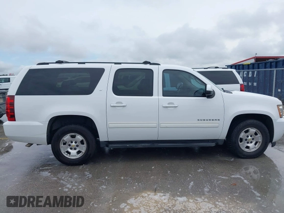 2012 Chevrolet Suburban LT with VIN 1GNSCJE00CR165813, listed as a IAAI auction lot 42494042 with 205,998 mi miles and . Bid and sale history available at DreamBid. Image 13.