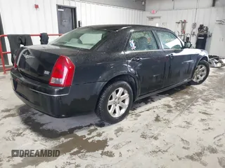 2007 Chrysler 300 Touring with VIN 2C3LA53G17H627980, listed as a IAAI auction lot 42006910 with 155,263 mi miles. Bid and sale history available at carsss.com. Image 4.
