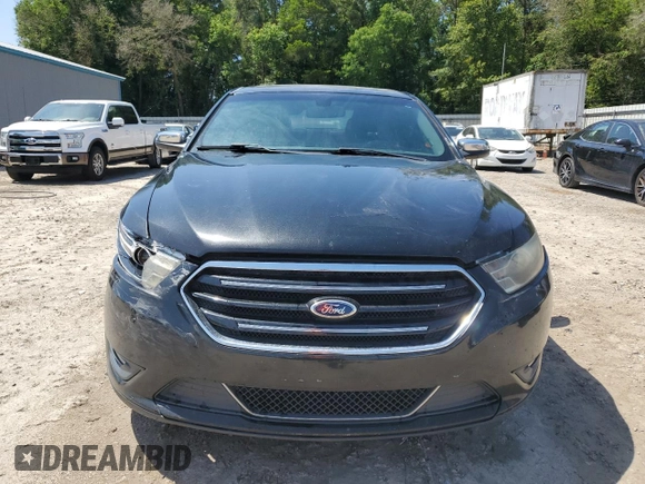 2015 Ford Taurus Limited z VIN 1FAHP2F82FG103711, wystawiony jako Copart lot #57158265 z przebiegiem 205 999 mil mil oraz Szkoda całkowita • Salvage title. Historia ofert i sprzedaży dostępna na DreamBid. Obrazek 5.