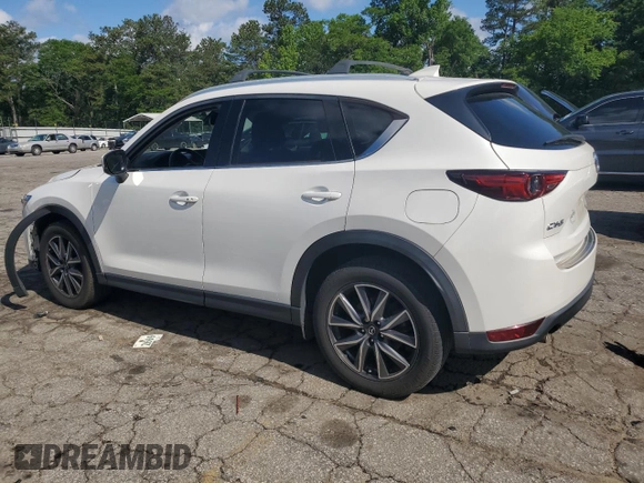 2018 Mazda CX-5 Grand Touring с VIN JM3KFADM3J1351532, выставлен на аукционе Copart как лот 55567405 с пробегом 99 134 миль миль и Списание • Salvage title. История ставок и продаж доступна на DreamBid. Изображение 2.