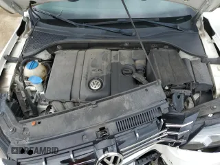 2013 Volkswagen Passat SEL Premium z VIN 1VWCH7A30DC039521, wystawiony jako Copart lot #56795935 z przebiegiem 127 052 mil mil oraz Nie do naprawy • Non repairable. Historia ofert i sprzedaży dostępna na DreamBid. Obrazek 11.