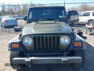 2006 Jeep Wrangler SE with VIN 1J4FA29116P763914, listed as a IAAI auction lot 42140140 with 107,161 mi miles. Bid and sale history available at carsss.com. Image 13.