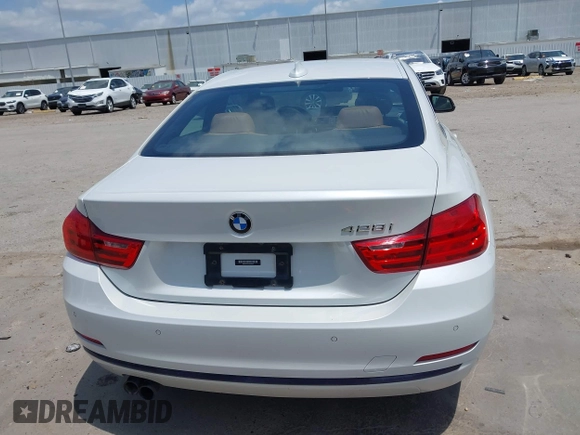 2016 BMW 4 Series 428i with VIN WBA3N7C51GK228910, listed as a IAAI auction lot 42341589 with 85,127 mi miles and . Bid and sale history available at DreamBid. Image 16.