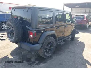 2021 Jeep Wrangler Unlimited Sport S with VIN 1C4HJXDN6MW812565, listed as a IAAI auction lot 41506140 with 27,273 mi miles and . Bid and sale history available at DreamBid. Image 4.