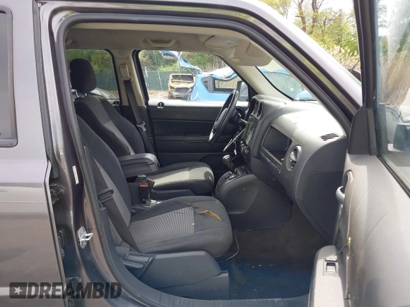 2014 Jeep Patriot Latitude with VIN 1C4NJRFB3ED847997, listed as a IAAI auction lot 42109140 with 121,299 mi miles and . Bid and sale history available at carsss.com. Image 5.