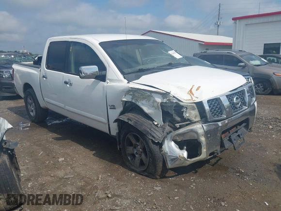 2004 Nissan Titan LE with VIN 1N6AA07B74N581334, listed as a IAAI auction lot 42265633 with 189,892 mi miles and . Bid and sale history available at DreamBid. Image 1.