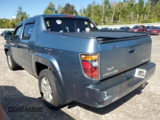2006 Honda Ridgeline RTL with VIN 2HJYK16556H545357, listed as a Copart auction lot 70656694 with 153,668 mi miles and Salvage Title. Bid and sale history available at carsss.com. Image 2.