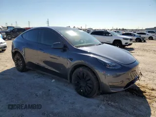 2023 Tesla Model Y Long Range with VIN 7SAYGDEE9PA180293, listed as a Copart auction lot 89062695 with 21,648 mi miles and Salvage Title. Bid and sale history available at DreamBid. Image 4.