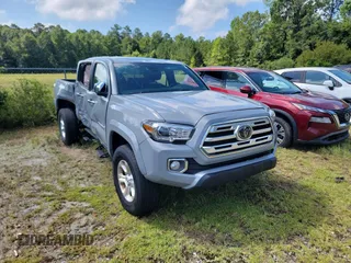 2018 Toyota Tacoma SR with VIN 3TMGZ5AN3JM180617, listed as a Copart auction lot 66294115 with 141,272 mi miles and Clean title. Bid and sale history available at DreamBid. Image 1.