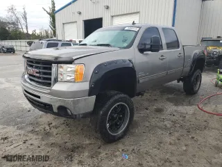 2009 GMC Sierra 2500HD SLT with VIN 1GTHK63679F154246, listed as a Copart auction lot 76985313 with 0 mi miles and Salvage Title. Bid and sale history available at carsss.com. Image 1.