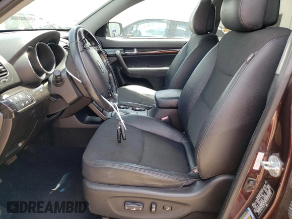 2012 Kia Sorento EX with VIN 5XYKU3A61CG206556, listed as a Copart auction lot 60078035 with Not provided miles and Salvage title. Bid and sale history available at DreamBid. Image 7.