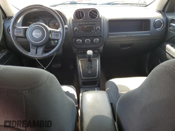 2016 Jeep Patriot Latitude with VIN 1C4NJRFB9GD637469, listed as a Copart auction lot 50377715 with 103,038 mi miles and Salvage title. Bid and sale history available at DreamBid. Image 8.