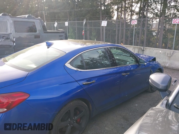 2020 Genesis G70 3.3T with VIN KMTG34LEXLU049127, listed as a IAAI auction lot 41376324 with 38,539 mi miles and . Bid and sale history available at DreamBid. Image 13.