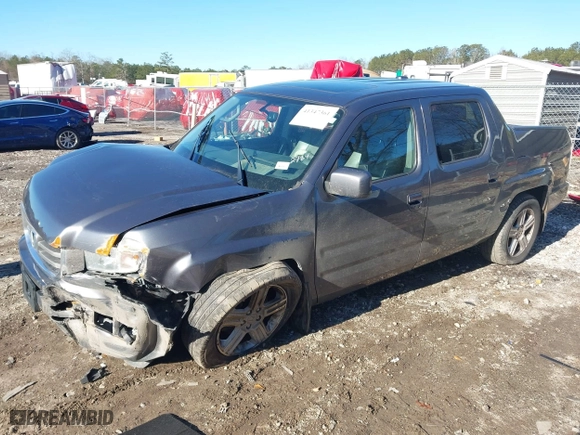 2014 Honda Ridgeline RTL with VIN 5FPYK1F52EB002984, listed as a IAAI auction lot 41347361 with 162,015 mi miles. Bid and sale history available at carsss.com. Image 2.