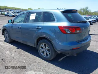 2014 Mazda CX-9 Touring with VIN JM3TB3CV1E0447130, listed as a IAAI auction lot 40815387 with 148,985 mi miles. Bid and sale history available at carsss.com. Image 3.