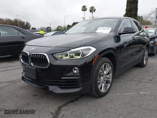 2020 BMW X2 sDrive28i with VIN WBXYH9C08L5R62746, listed as a IAAI auction lot 41788571 with 20,981 mi miles. Bid and sale history available at carsss.com. Image 2.