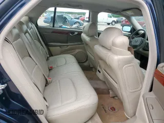 2005 Cadillac DeVille z VIN 1G6KD54Y75U129768, wystawiony jako Copart lot #55890325 z przebiegiem 97 463 mil mil oraz Czysty tytuł • Clean title. Historia ofert i sprzedaży dostępna na DreamBid. Obrazek 10.