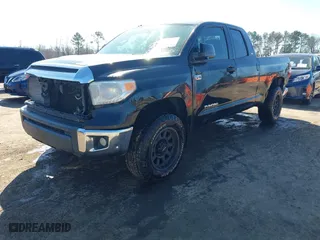 2015 Toyota Tundra 4WD Truck SR with VIN 5TFUW5F18FX437872, listed as a IAAI auction lot 41483349 with 276,068 mi miles. Bid and sale history available at carsss.com. Image 17.