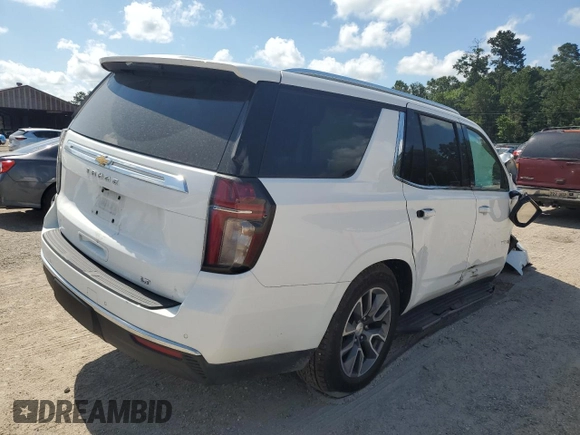 2021 Chevrolet Tahoe LT z VIN 1GNSCNKD1MR130424, wystawiony jako Copart lot #62596485 z przebiegiem 106 648 mil mil oraz Szkoda całkowita • Salvage title. Historia ofert i sprzedaży dostępna na DreamBid. Obrazek 3.