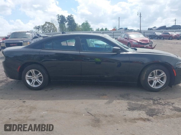 2023 Dodge Charger SXT z VIN 2C3CDXBG8PH607746, wystawiony jako IAAI lot #41856107 z przebiegiem 42 519 mil mil oraz . Historia ofert i sprzedaży dostępna na DreamBid. Obrazek 13.