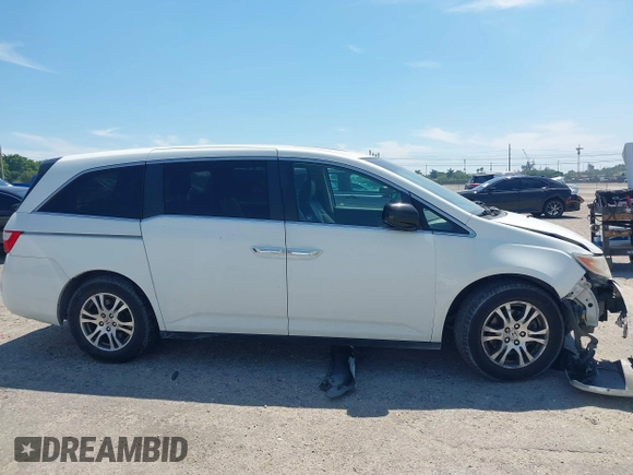 2012 Honda Odyssey EX-L with VIN 5FNRL5H61CB019215, listed as a IAAI auction lot 41837320 with 248,498 mi miles and . Bid and sale history available at DreamBid. Image 14.