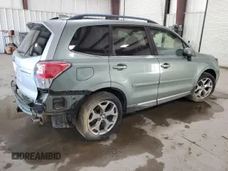 2017 Subaru Forester Touring with VIN JF2SJAWC5HH572306, listed as a Copart auction lot 63699995 with Not provided miles and Salvage title. Bid and sale history available at DreamBid. Image 3.