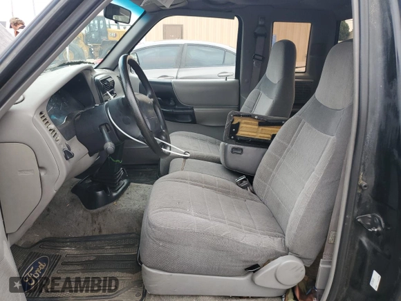 1997 Ford Ranger XL with VIN 1FTCR14A2VPB52159, listed as a Copart auction lot 63452045 with 207,582 mi miles and Salvage title. Bid and sale history available at DreamBid. Image 7.