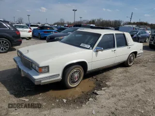 1986 Cadillac DeVille z VIN 1G6CD6988G4317303, wystawiony jako Copart lot #50882775 z przebiegiem 138 443 mil mil oraz Czysty tytuł • Clean title. Historia ofert i sprzedaży dostępna na DreamBid. Obrazek 1.