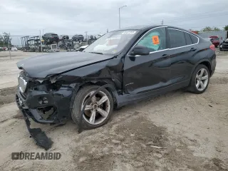 2015 BMW X4 xDrive28i with VIN 5UXXW3C51F0M88632, listed as a Copart auction lot 82401313 with 0 mi miles. Bid and sale history available at carsss.com. Image 1.