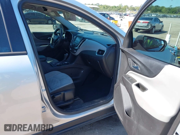 2018 Chevrolet Equinox LS with VIN 3GNAXHEV8JS502212, listed as a IAAI auction lot 42064863 with 107,321 mi miles and . Bid and sale history available at DreamBid. Image 5.