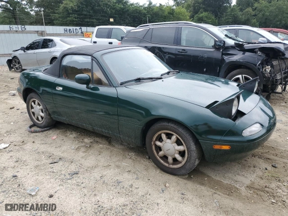1991 Mazda MX-5 Miata Special Edition with VIN JM1NA3510M0232433, listed as a Copart auction lot 60387174 with 192,365 mi miles and Salvage Title. Bid and sale history available at carsss.com. Image 4.