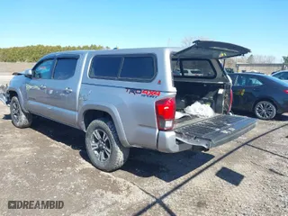 2018 Toyota Tacoma SR with VIN 3TMCZ5AN5JM138271, listed as a IAAI auction lot 41806982 with 95,712 mi miles. Bid and sale history available at carsss.com. Image 3.