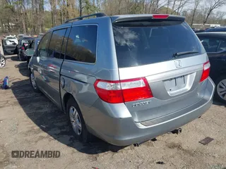 2007 Honda Odyssey EX-L with VIN 5FNRL38677B054173, listed as a IAAI auction lot 41888792 with 142,438 mi miles and . Bid and sale history available at DreamBid. Image 3.