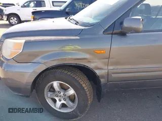 2007 Honda Pilot EX-L with VIN 2HKYF18667H501911, listed as a IAAI auction lot 41752356 with 267,277 mi miles and . Bid and sale history available at DreamBid. Image 6.