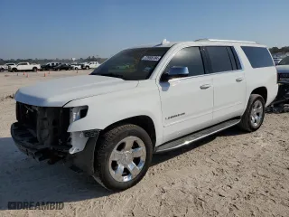 2017 Chevrolet Suburban Premier with VIN 1GNSCJKC7HR128988, listed as a Copart auction lot 73958784 with 121,662 mi miles and Salvage Title. Bid and sale history available at carsss.com. Image 1.